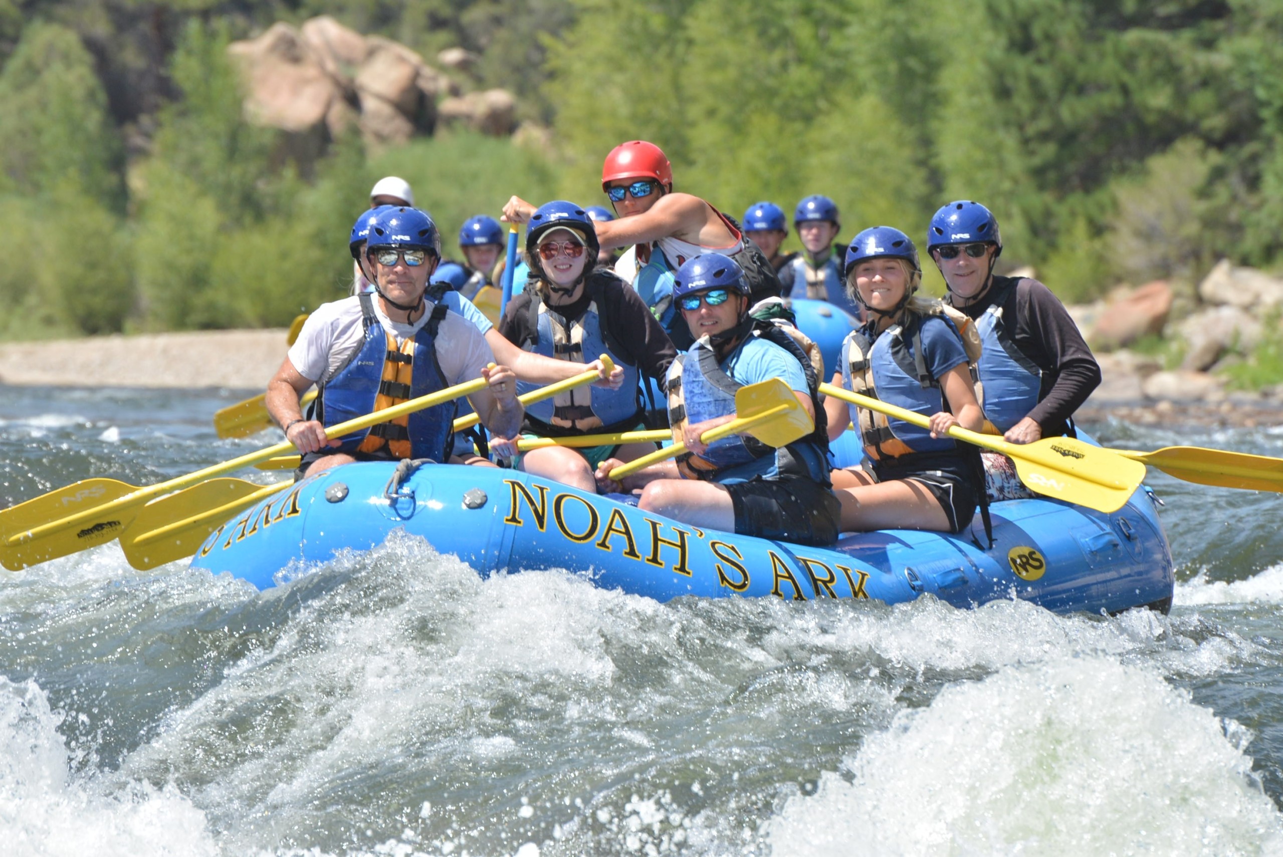 Father Teen Adventure members raft on the Arkansas river.